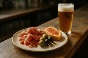 5014 El aperitivo que acompaña a la bebida en bares y restaurantes se llama...